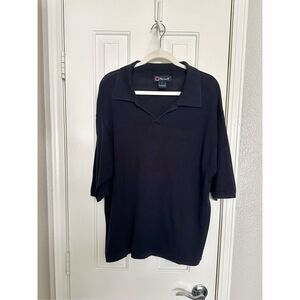 Faconnable men’s blue knit polo designed by Albert Goldberg ￼